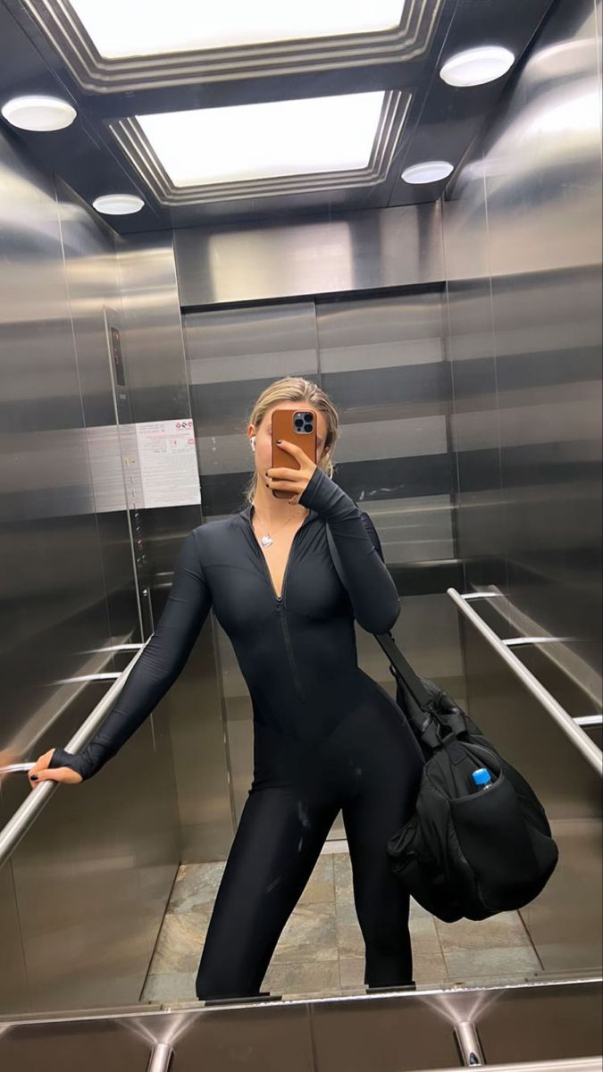 ENTERIZO MANGA LARGA CON CREMALLERA NEGRO